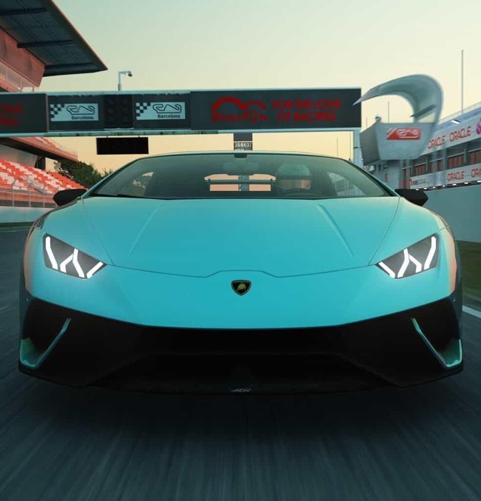 Blue Lamborghini Huracán driving 300km/h in a virtual racing track in Catalonia, Spain with mobile hired simulator.