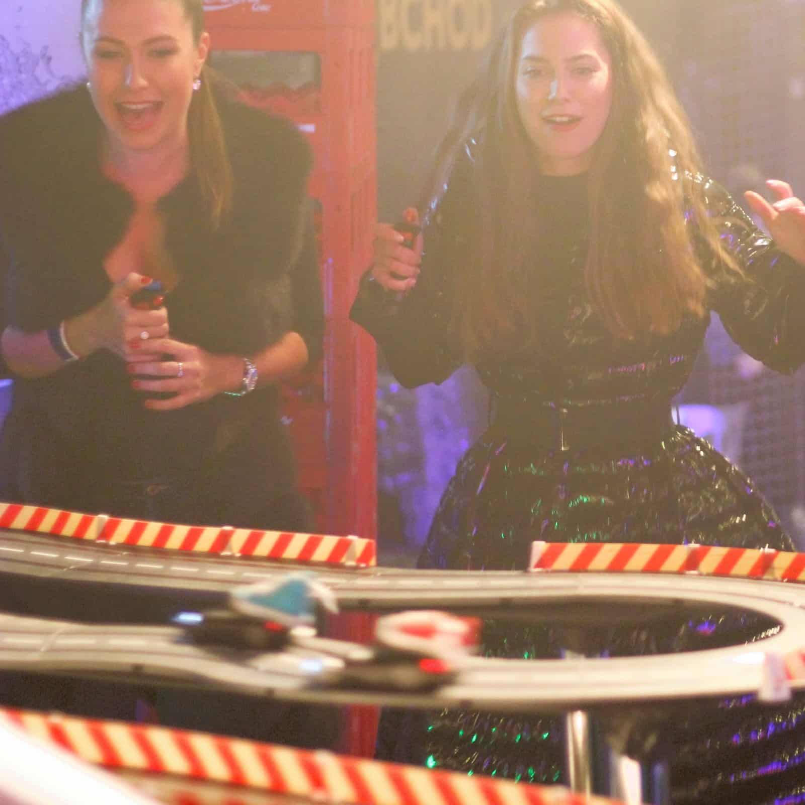 RoarFun Clients Škoda Auto happy girls on cars race track at modern promo event