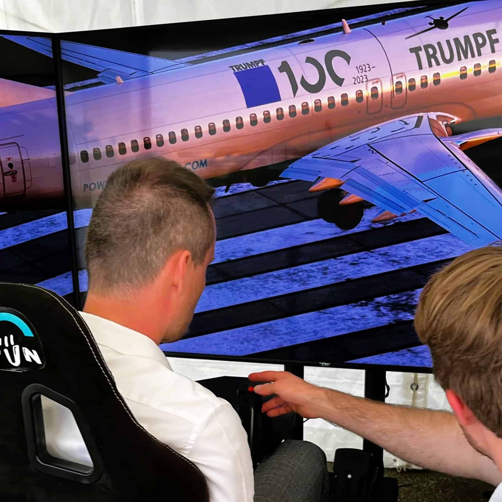 RoarFun Clients Trumpf 100 years anniversary integrated logo on the airplane immersive flight simulator at 100 years company anniversary
