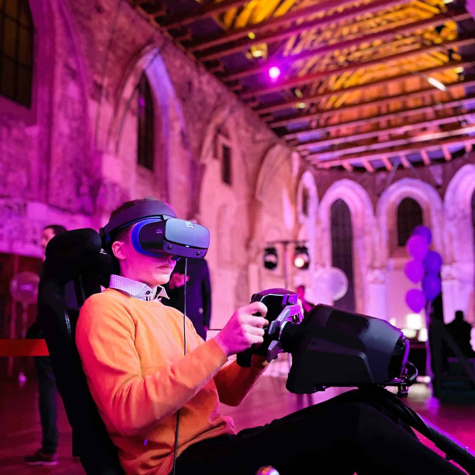 RoarFun Clients SentinelOne Aston Martin F1 team sponsor - mobile Formula 1 immersive motion F1 simulator at Christmas Party.