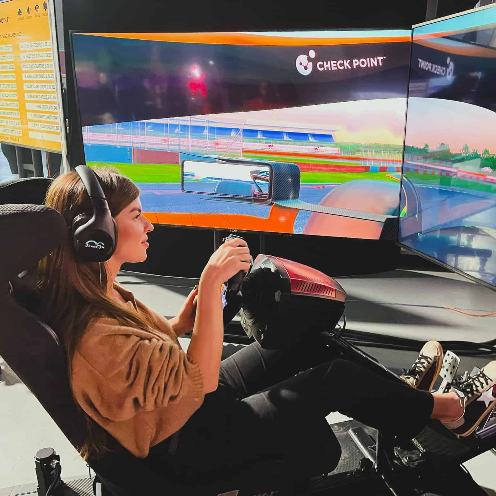 RoarFun Clients Check Point CPX 360 IT security conference immersive Formula simulator with RoarFun Grand Prize screen